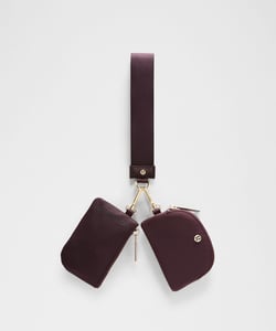 Track Stock of Lululemon Dual Pouch Wristlet - Black Plum/Goodnight Plum