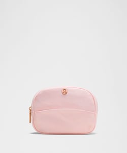 Track Stock of Lululemon City Essentials Pouch Mini - Pink Pearl/Rose Gold