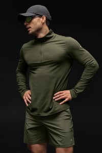 Track Stock of Alo Yoga Conquer 1/4 Zip Reform Long Sleeve - Green Olive