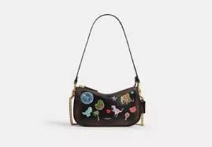 Track Stock of Coach Rexy 10th Birthday Notebook In Loved Leather