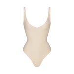Track Stock of Skims Body Unlined Plunge Thong Bodysuit - Sand - M