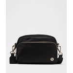 Track Stock of Lululemon Everywhere Crossbody Bag 2L - Metal Hardware - Black/Gold