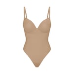 Track Stock of Skims Ultimate Body Push Up Thong Bodysuit  - Clay