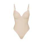 Track Stock of Skims Ultimate Body Push Up Thong Bodysuit  - Sand