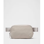 Track Stock of Lululemon Everywhere Belt Bag 1L - Downtown Tan/Silver