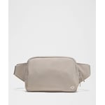 Track Stock of Lululemon Everywhere Belt Bag Large 2L - Downtown Tan/Silver
