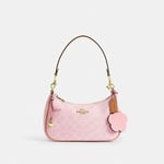 Track Stock of Teri Shoulder Bag In Signature Canvas With Charms - Gold/Powder Pink