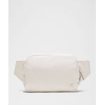 Track Stock of Lululemon Everywhere Belt Bag Large 2L - Light Ivory/Silver